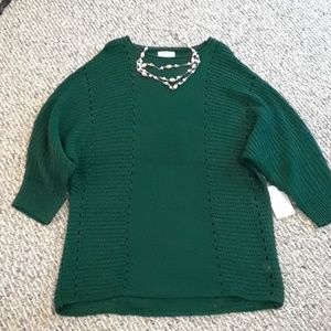 Deep green sweater